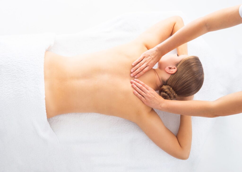 Young,Woman,Getting,Massaging,Treatment,Over,White.,Spa,,Healthcare,And